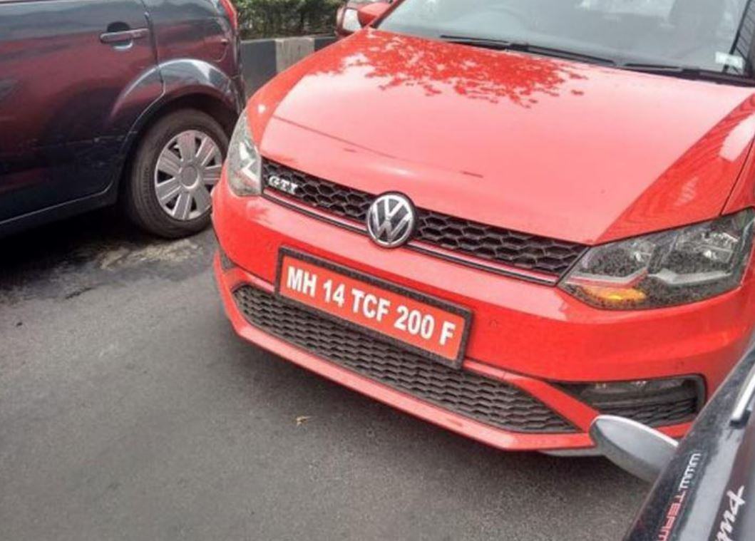 car red colour teporary number plate